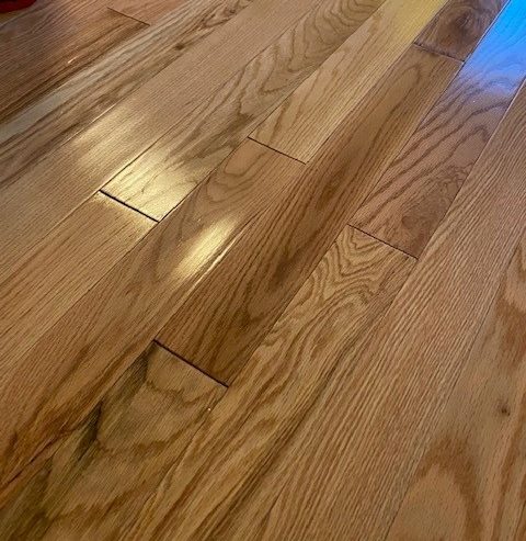 The hardwood floors experienced water damage.