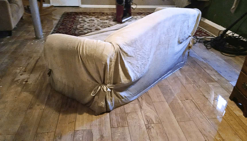 Water logged sofa and rug to be thrown out after flood