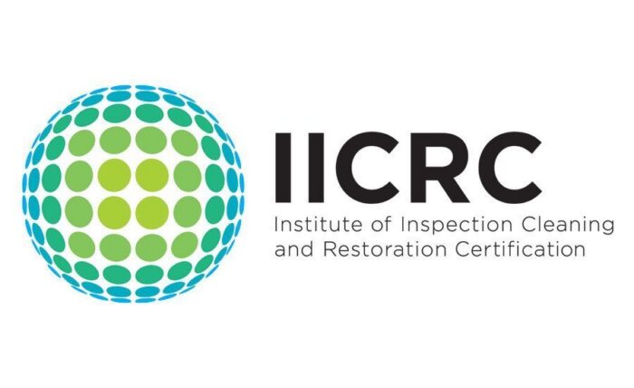 Official IICRC logo featuring a green and blue dotted globe next to the full