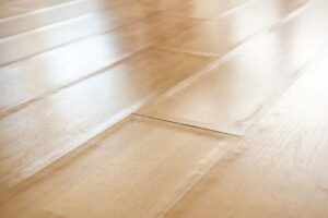 Laminate floor showing a raised area or bubble at a