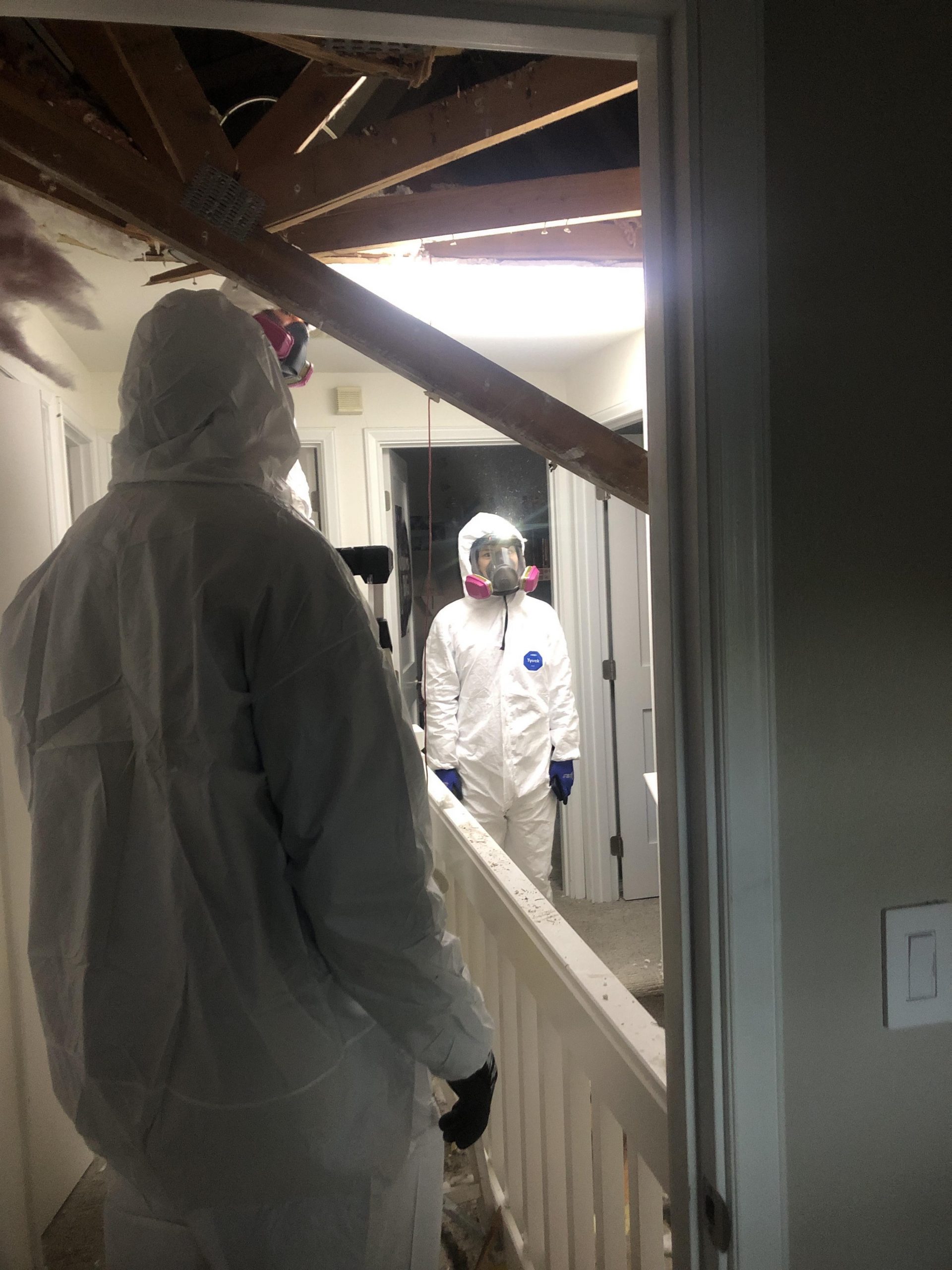 Team members in protective equipment