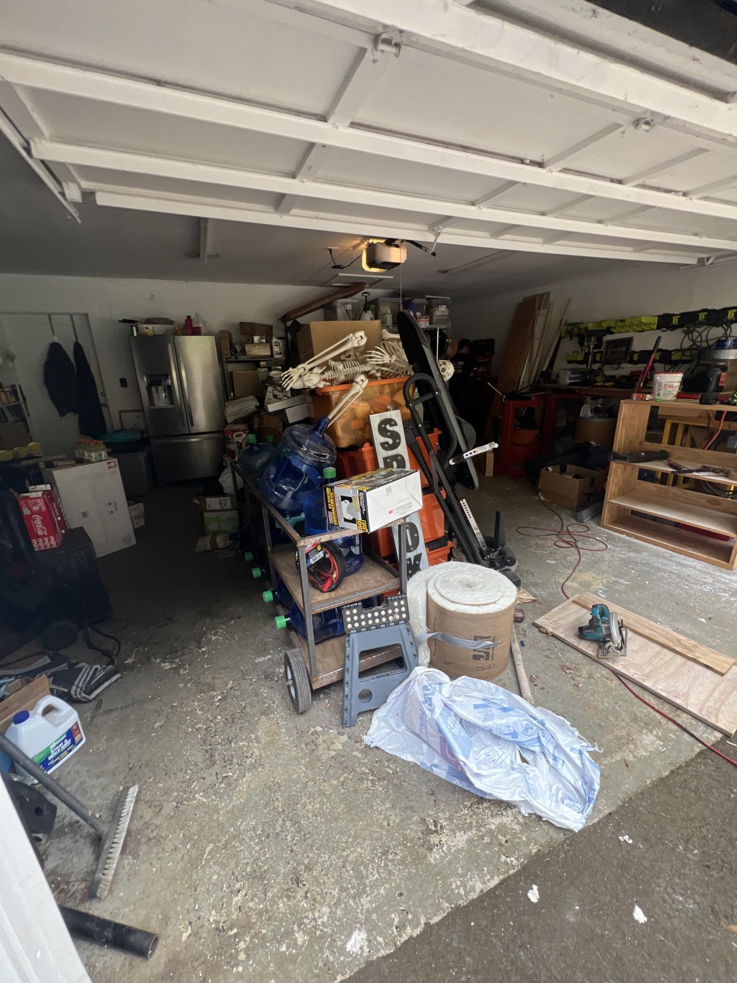 Garage interior during water damage cleanup process