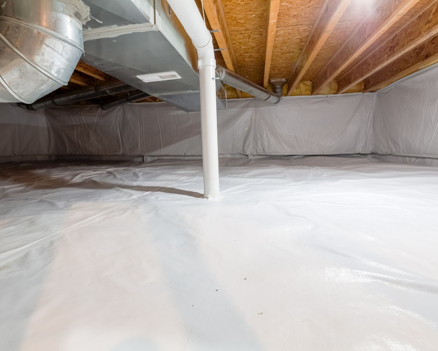 Professional crawl space encapsulation with vapor barrier installed