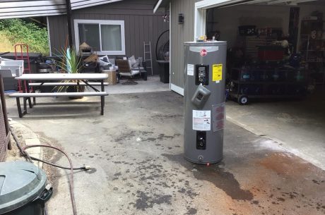 Water Heater Leak Floods Snohomish Garage and Living Room: A Restoration Story