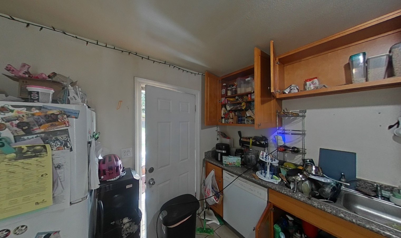 Kitchen smoke damage after fire in adjacent unit
