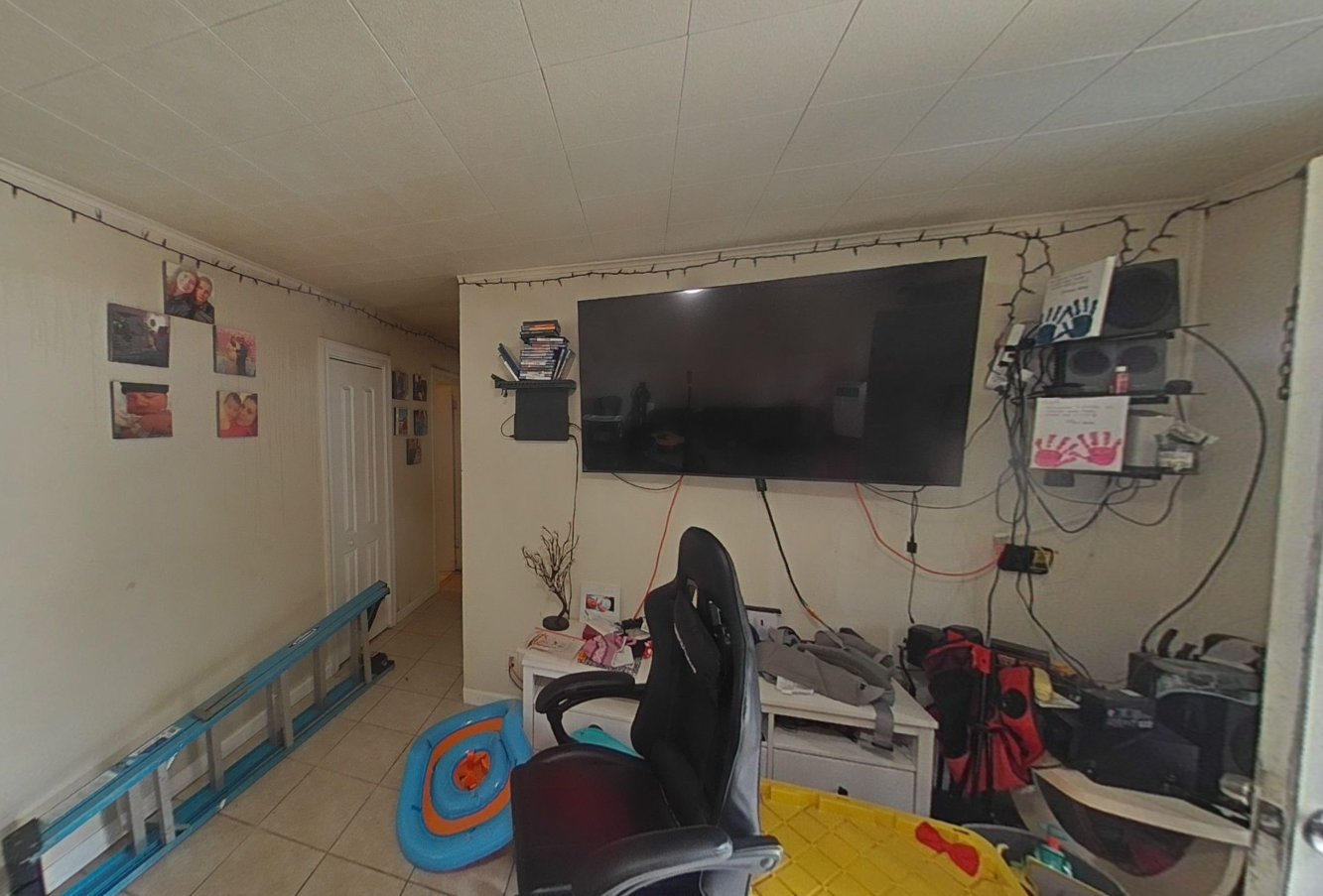 Living room with smoke damage after neighboring unit fire