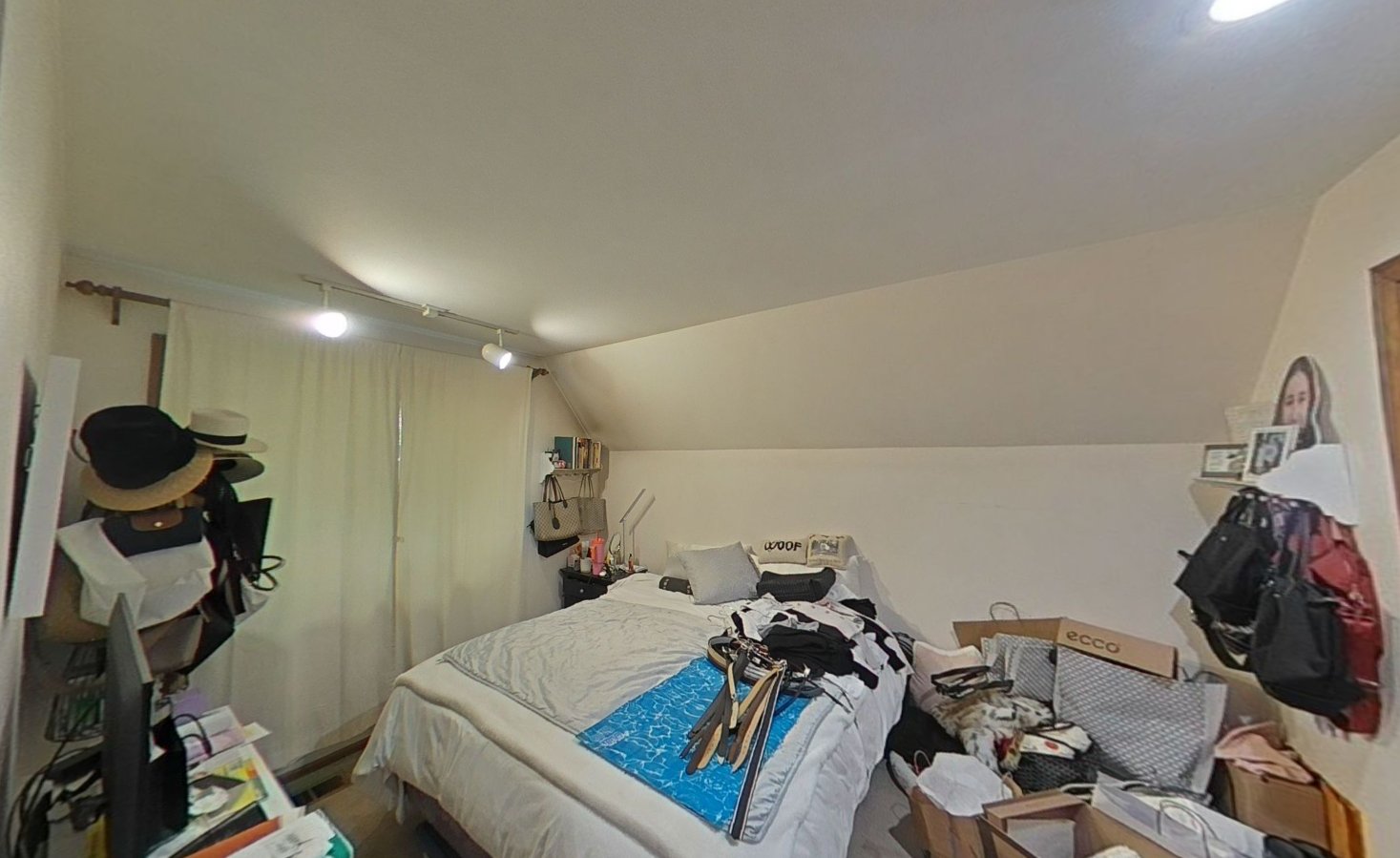 Upstairs bedroom with sloped ceiling and contents cleaned in place after ABC powder contamination