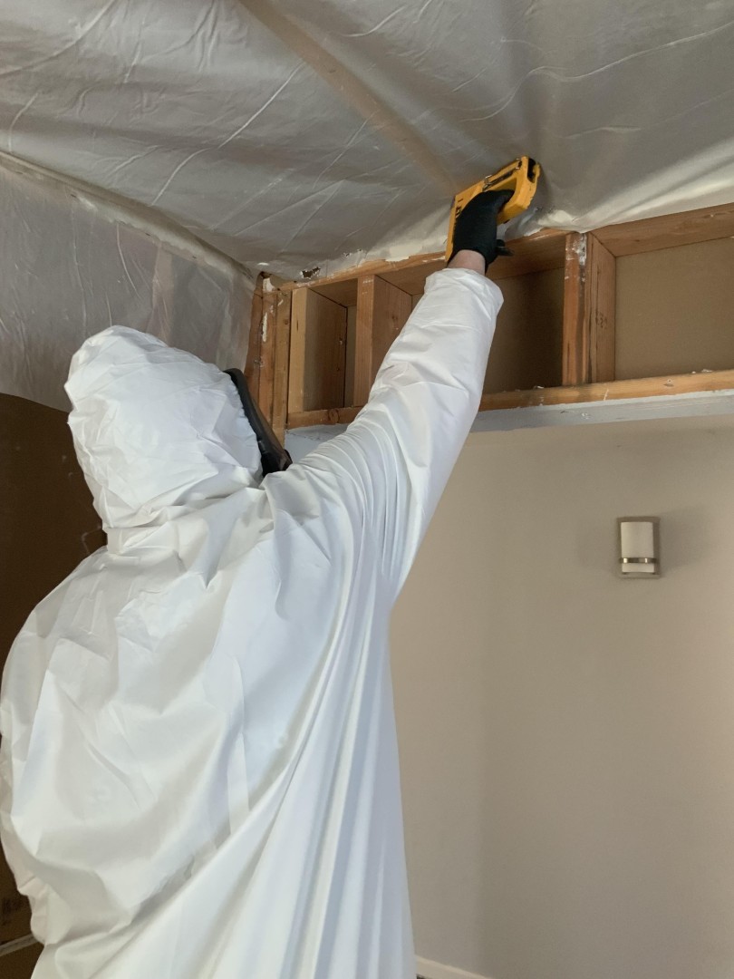 Containment barriers installed after selective demolition inside the fire damaged Everett home