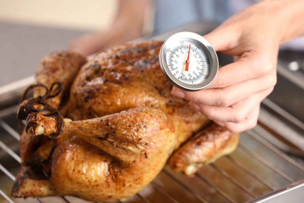 Cooking your turkey to an internal temperature of 165 degrees Fahrenheit is a Thanksgiving safety tip.