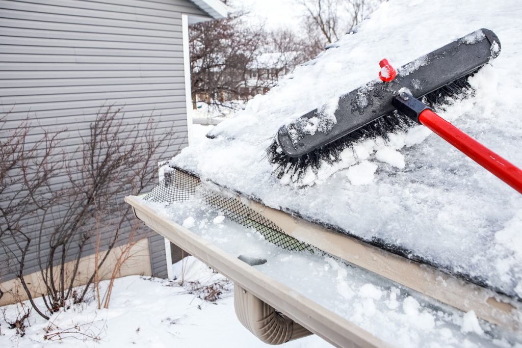 removing snow from roof