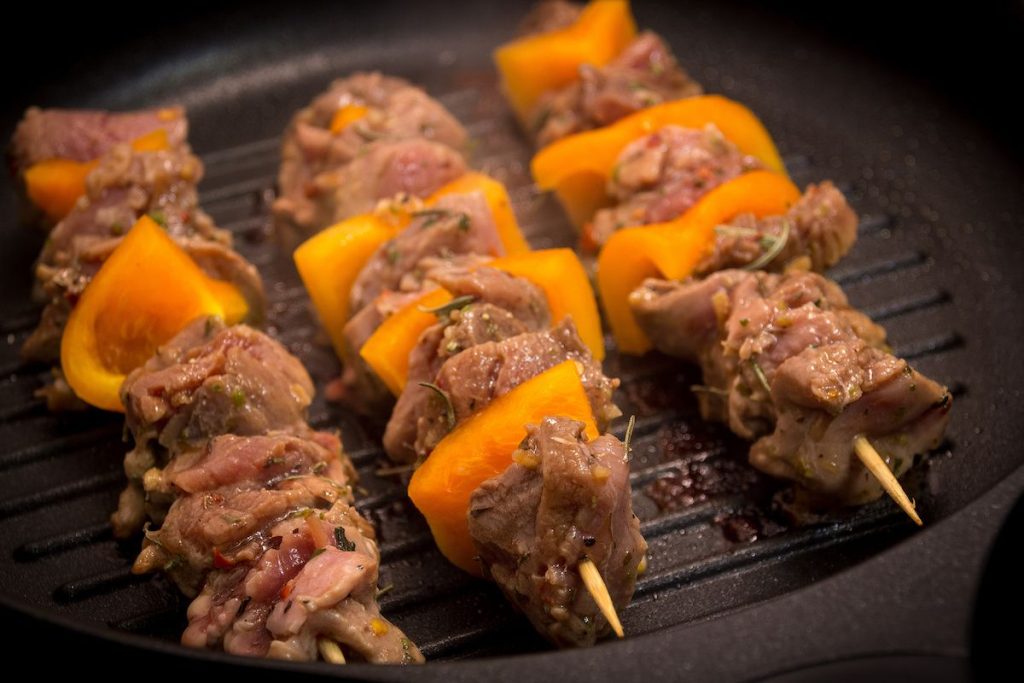 Kebabs on an indoor grill.