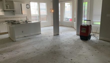 Water damaged kitchen in the process of restoration.