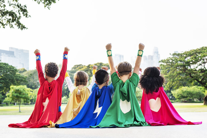 five children dressed as superheroes