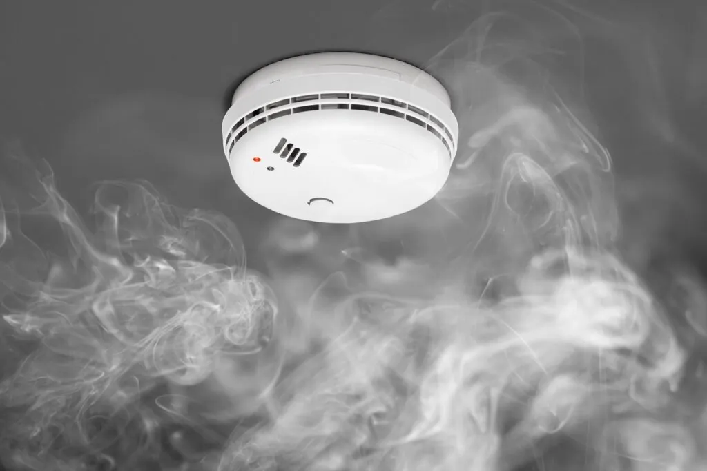 smoke detector of fire alarm in action