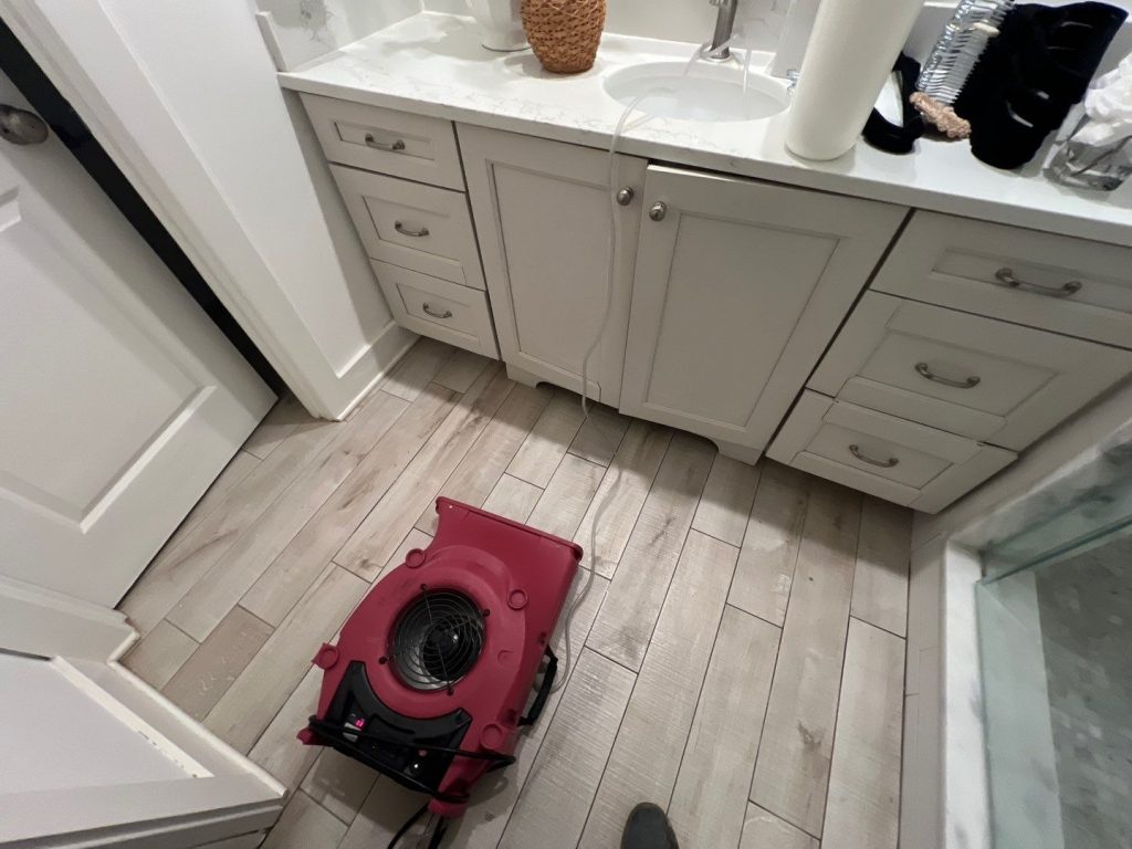 cabinet and vanity drying after water damage with high tech tools