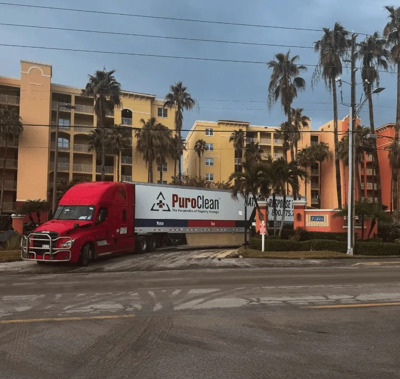 PuroClean semi truck at a commercial condo building after a disaster needing commercial fire damage restoration services