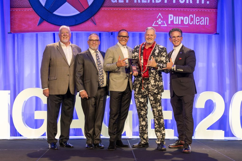 PuroClean Cares Award winners Gregory Arianoff and Christopher Sibel with PuroClean leadership