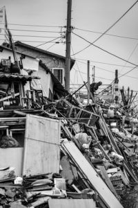 recover from a natural disaster - debris from earthquake and down electrical lines