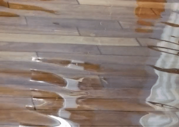 Heavy flooding on wooden flooring- water damage restoration