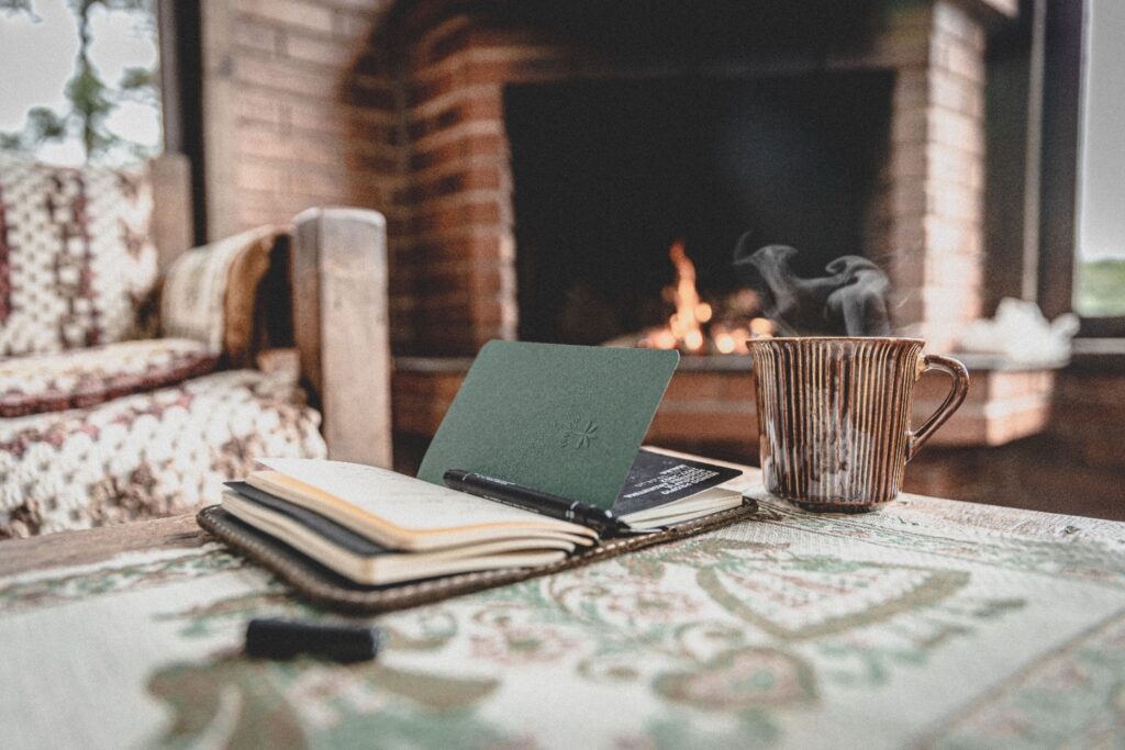 Coffee mug near a fireplace