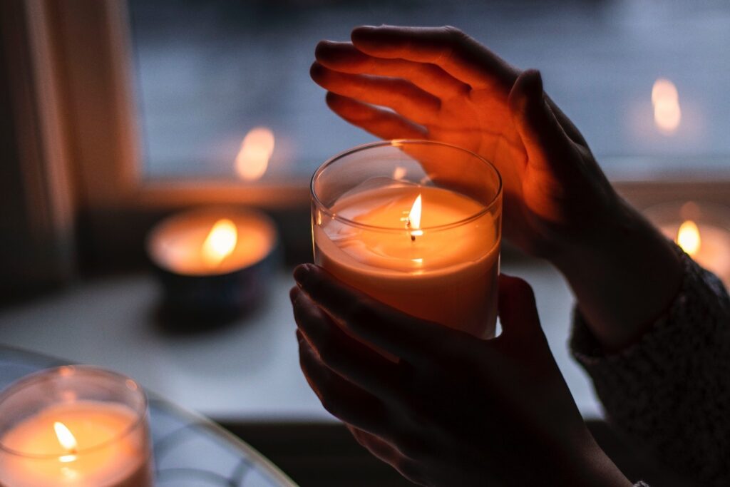 A woman holding candle