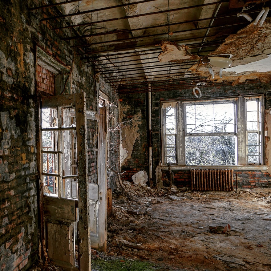 Abandon house wall covered with molds